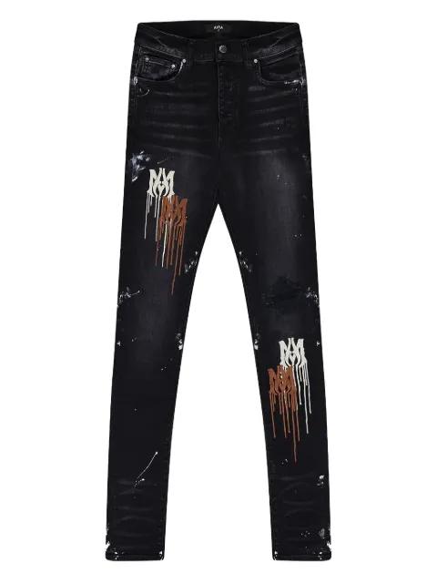 paint-drip jeans by AMIRI