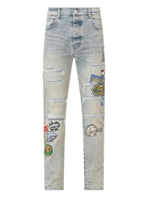 patch repair station slim jeans by AMIRI