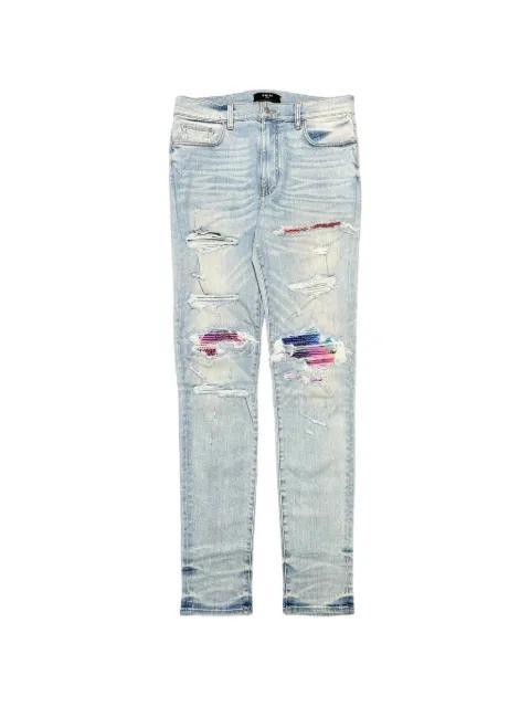 ripped jeans by AMIRI