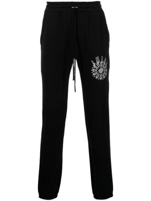 slim-cut logo-print track pants by AMIRI