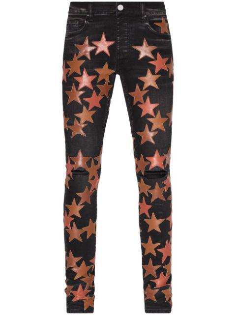 star-patch jeans by AMIRI
