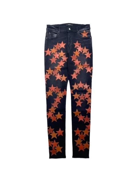 star-patch jeans by AMIRI