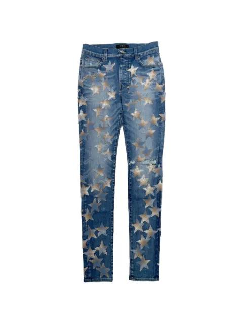 star-patch jeans by AMIRI