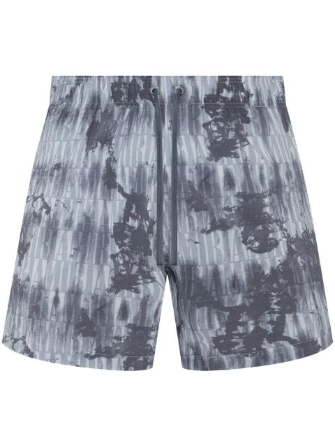 tie-dye pattern swim shorts by AMIRI