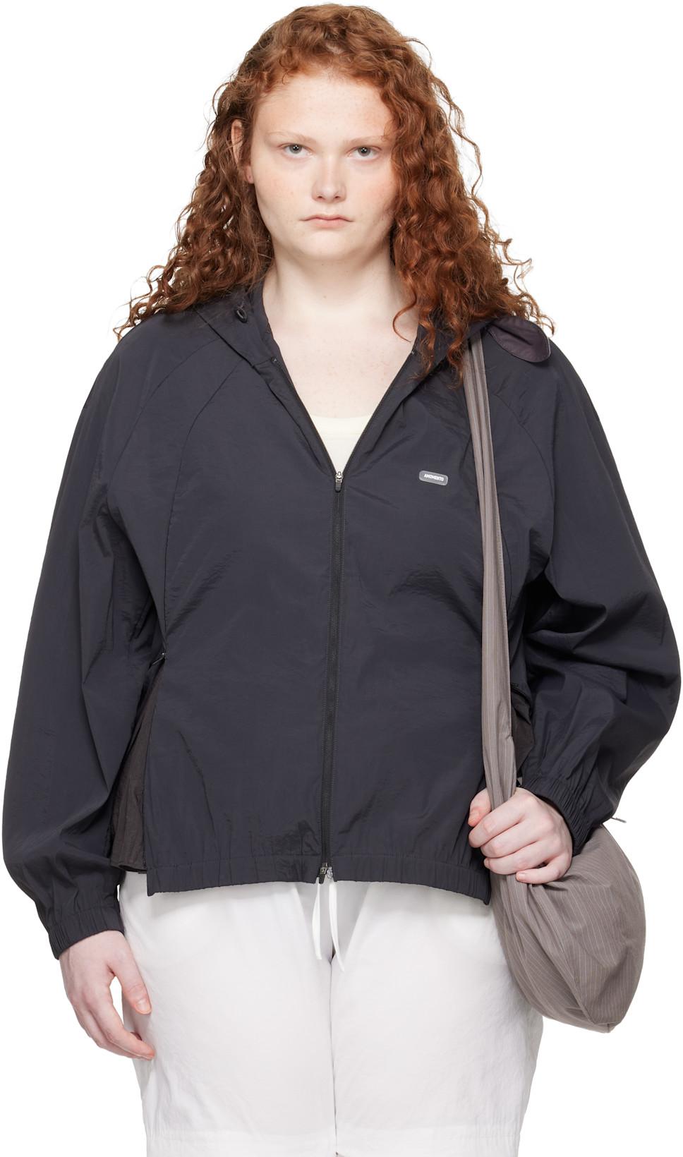 Black Nylon Raglan Hooded Jacket by AMOMENTO