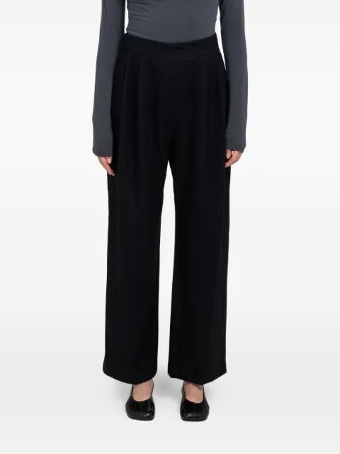 wool wrap trousers by AMOMENTO