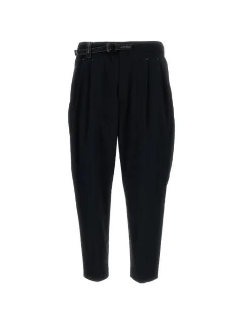 UV-cut pleated trousers by AND WANDER