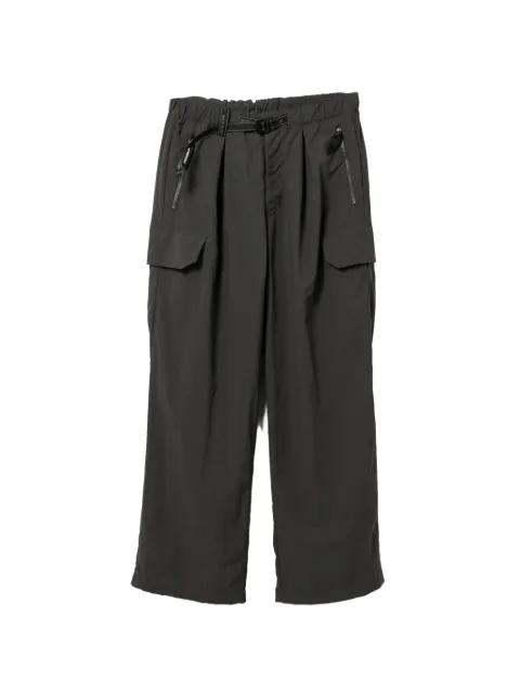 cargo trousers by AND WANDER