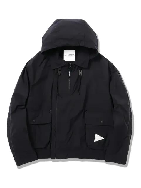 hoodied water-repellent jacket by AND WANDER