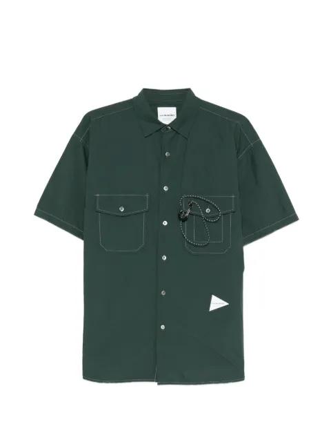 multiple-pockets shirt by AND WANDER
