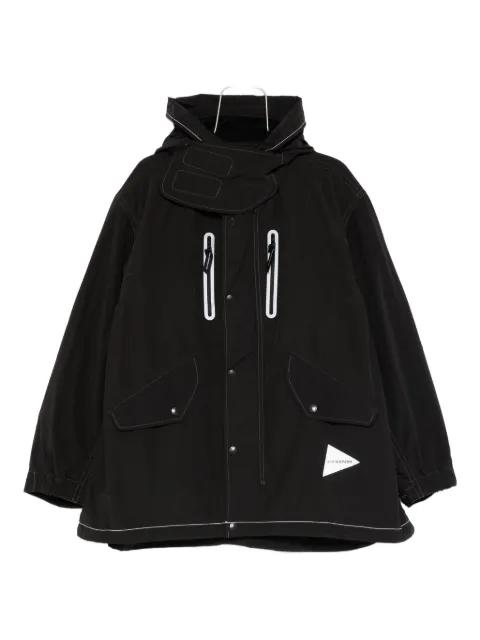 reflective-stitching coat by AND WANDER