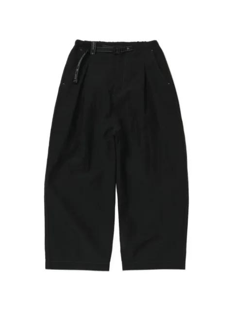 x Gramicci belted pleated trousers by AND WANDER