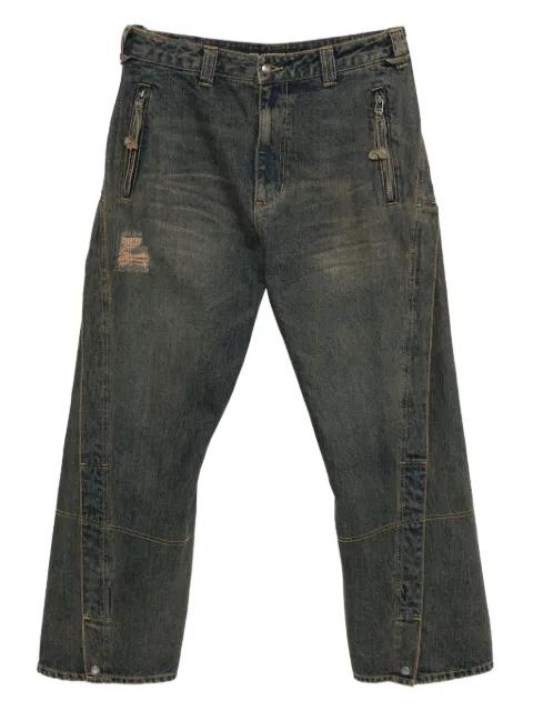 twisted zipped-pockets jeans by ANDERSSON BELL