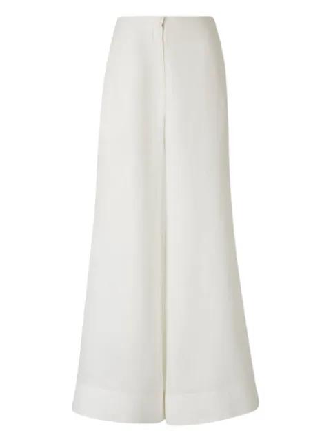 patch-pocket trousers by ANDRES OTALORA