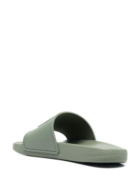 logo-embossed faux-leather slides by ANINE BING