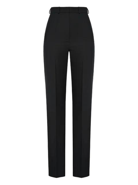 pressed-crease trousers by ANOUKI