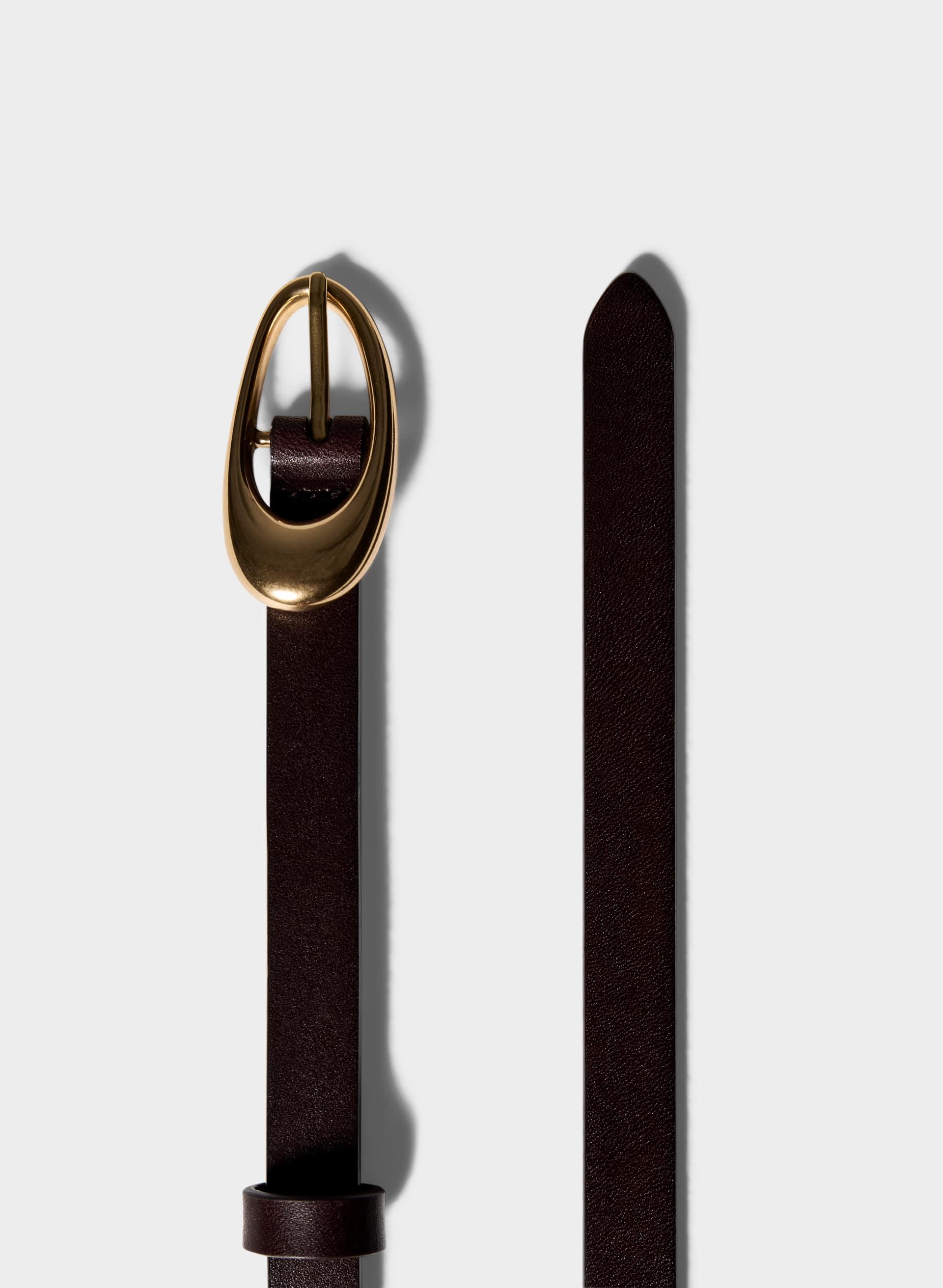 PERENNIAL SOLID BRASS LEATHER SLIM BELT by ARITZIA