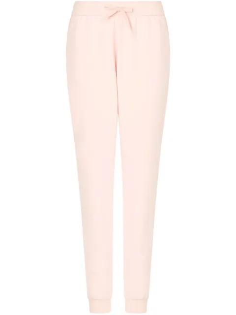 stretch track pants by ARMANI EXCHANGE