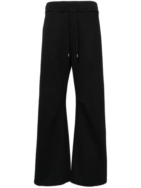 drawstring-waistband trousers by ATTACHMENT