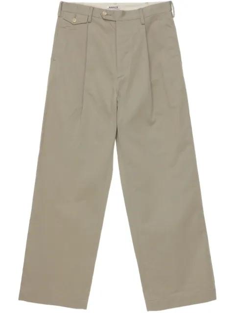 pintuck-detail chino trousers by AURALEE