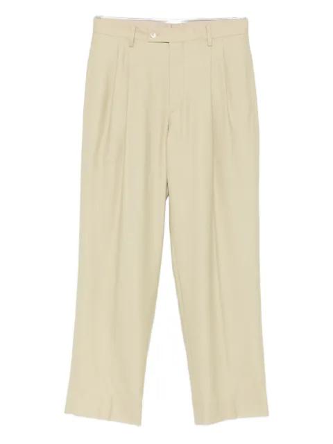 pleated tailored trousers by AURALEE