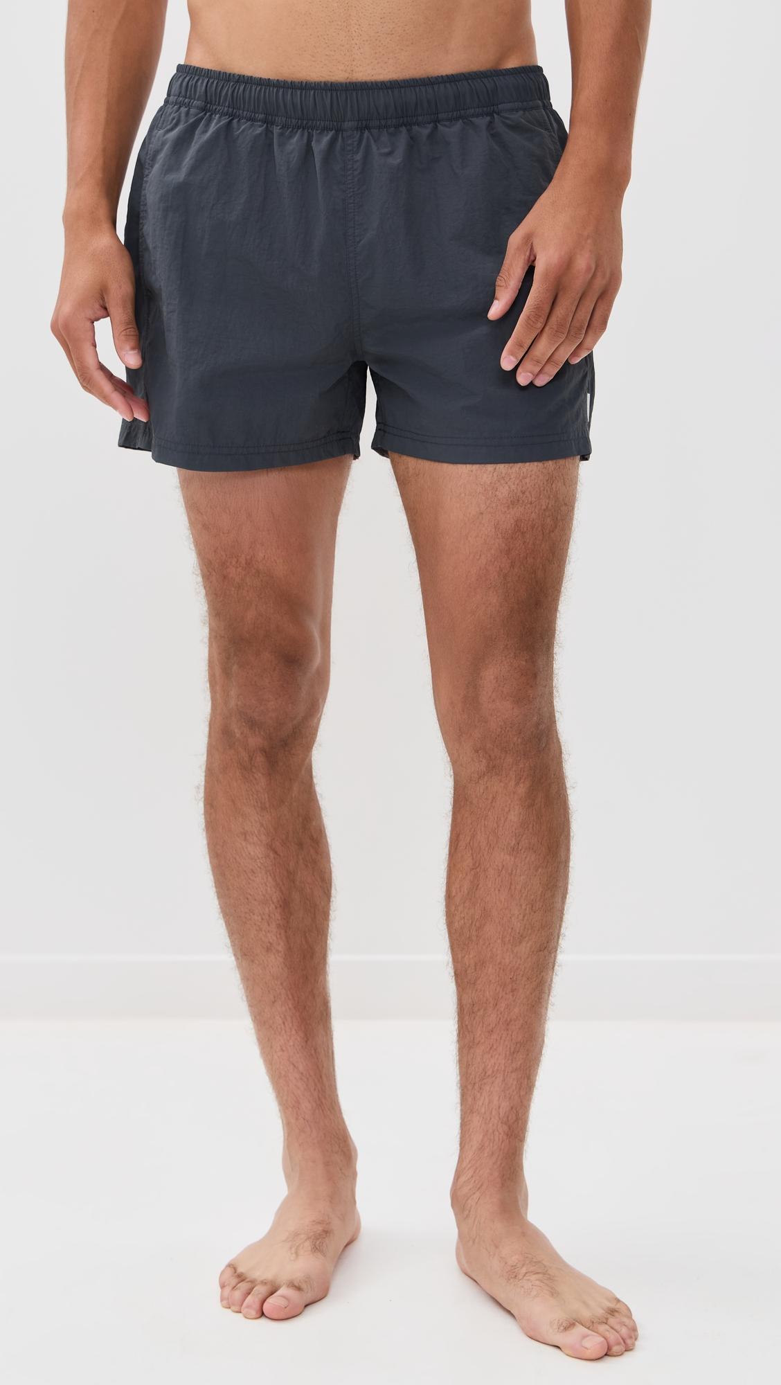 Solid Sebastian Swim Trunks 4" by AUTO-REPLY
