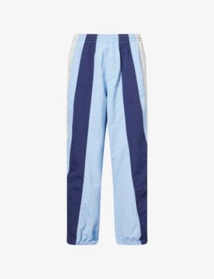 Pusherman Panelled Track Shell Jogging Bottoms by AWAKE NY
