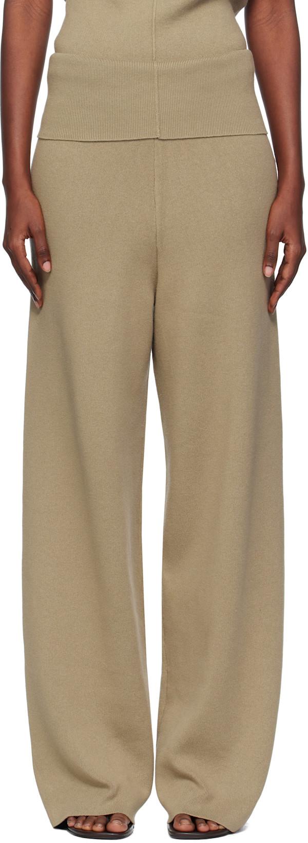 Beige Fold Over Seam Trousers by AYA MUSE