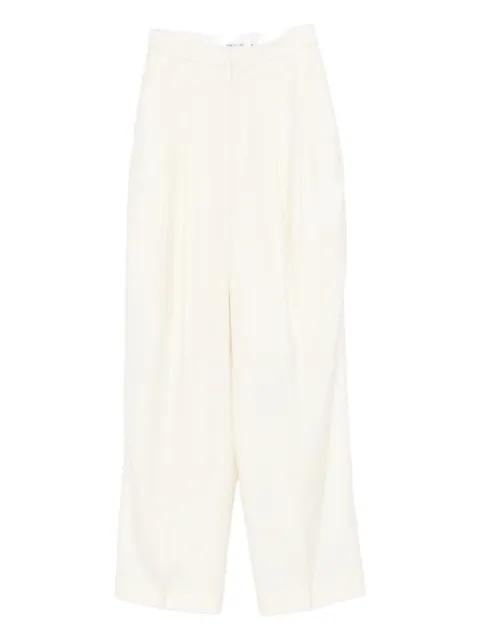 pleated trousers by AYA MUSE