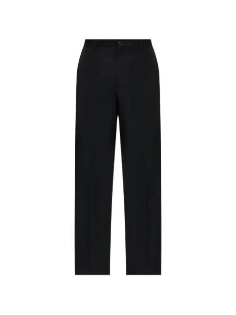 button fastening trousers by BALENCIAGA