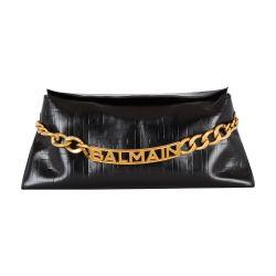 1945 Soft clutch in monogrammed calfskin by BALMAIN