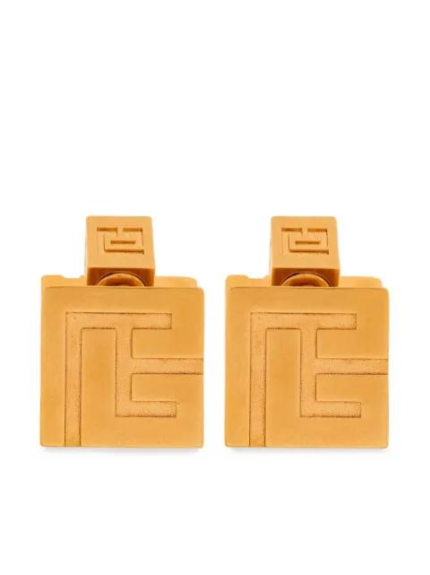 PB-monogram engraved stud earrings by BALMAIN