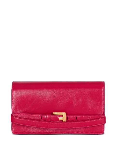 belt-detail clutch bag by BALMAIN