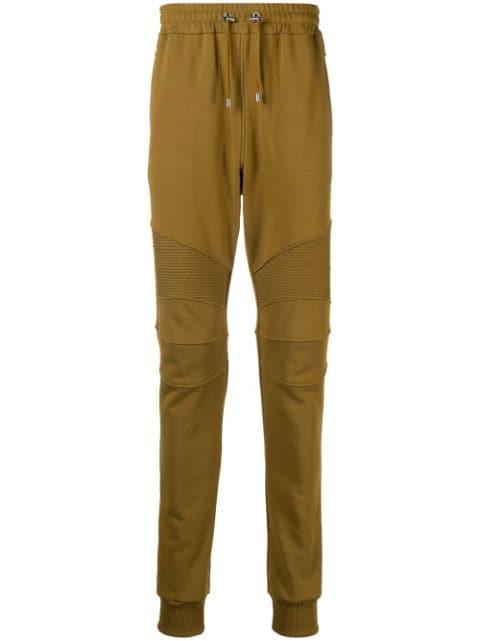 flocked-logo organic-cotton track trousers by BALMAIN
