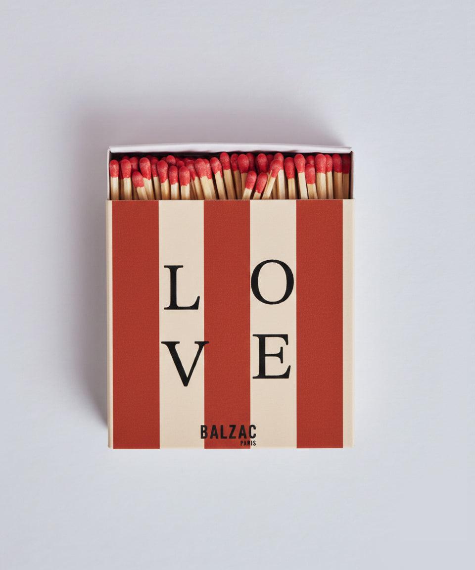 Red striped matchbox by BALZAC PARIS