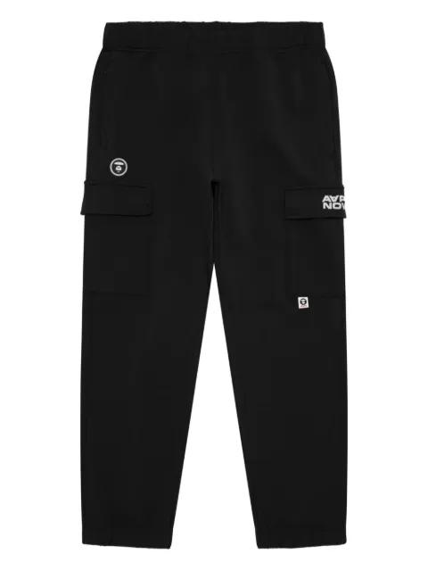 AAPENOW Moonface cargo track pants by BAPE