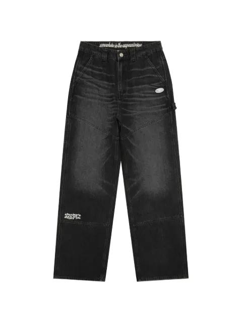 Moonface-appliqué jeans by BAPE
