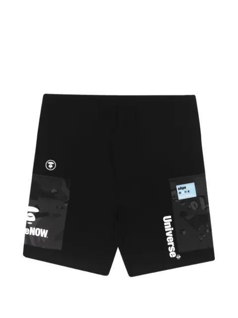 Moonface camo-print shorts by BAPE