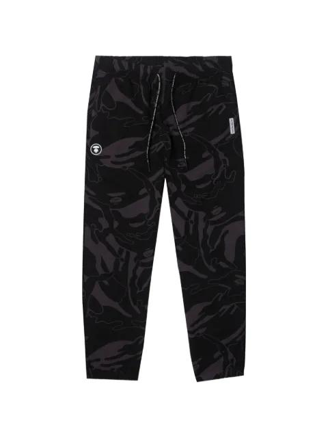 Moonface camo-print track pants by BAPE