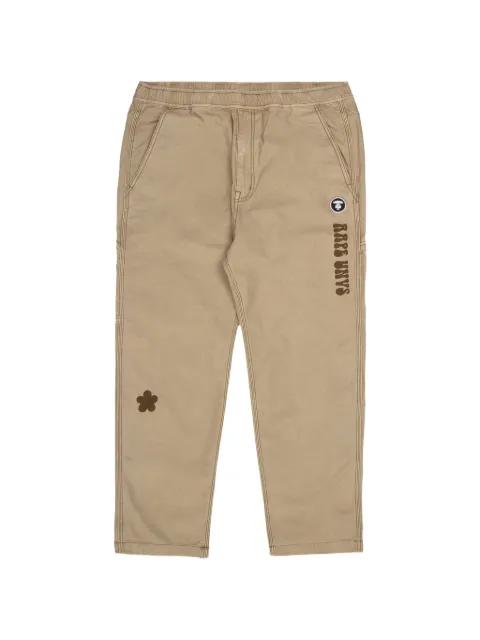 Moonface carpenter trousers by BAPE