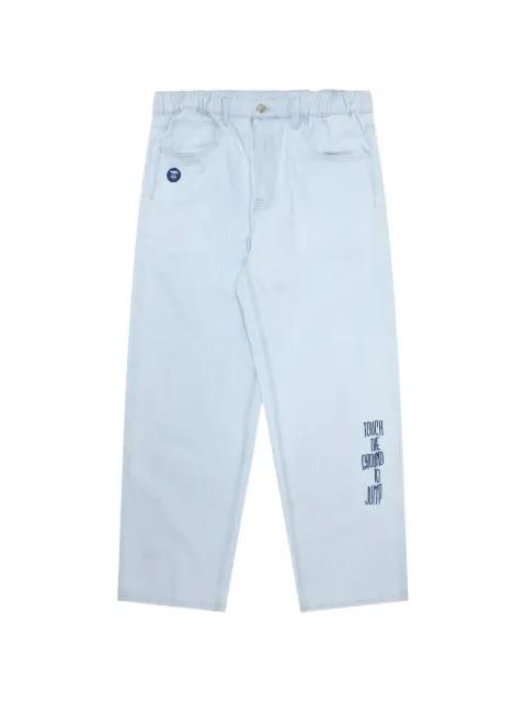 Moonface embroidered jeans by BAPE