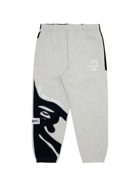 Moonface embroidered track pants by BAPE