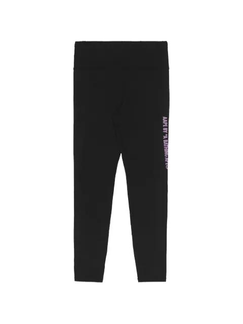 Moonface logo-print leggings by BAPE