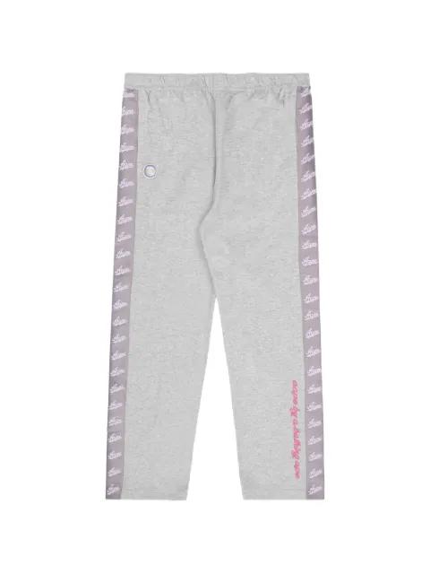 Moonface logo-tape track pants by BAPE