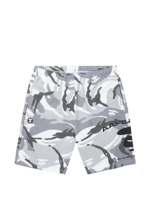 Moonface-patch camo shorts by BAPE