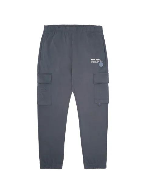 Moonface patch cargo trousers by BAPE