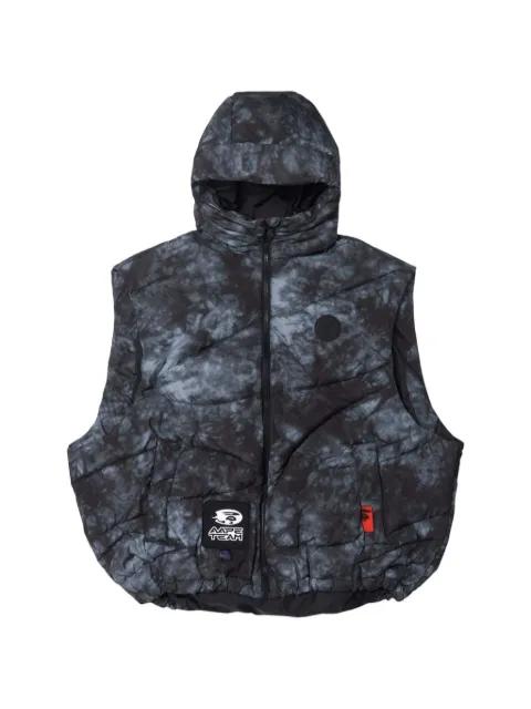 Moonface-patch tie-dye padded gilet by BAPE