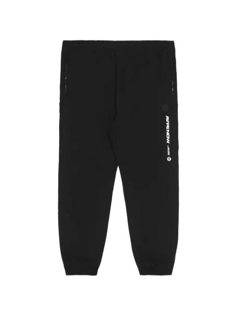 Moonface patch track pants by BAPE