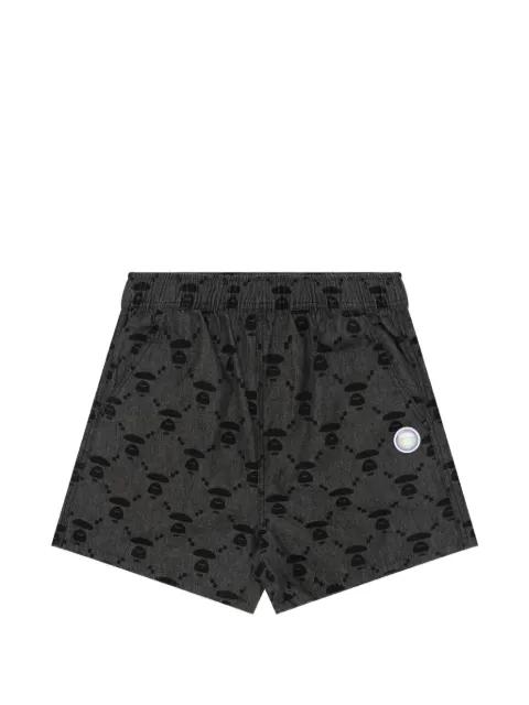 Moonface patterned shorts by BAPE