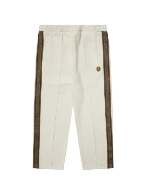 Moonface pintuck track pants by BAPE